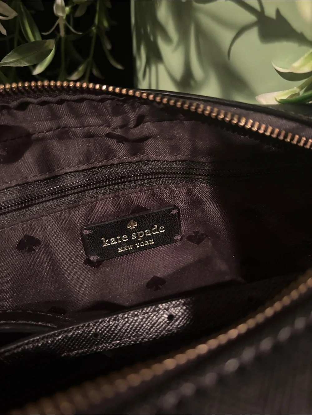 kate spade black saffiano leather zip-around wallet with gold logo